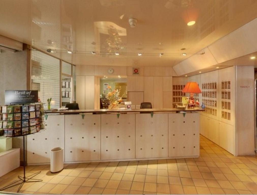 Kuchyň nebo kuchyňský kout v ubytování Brit Hotel Cahors - Le Valentré