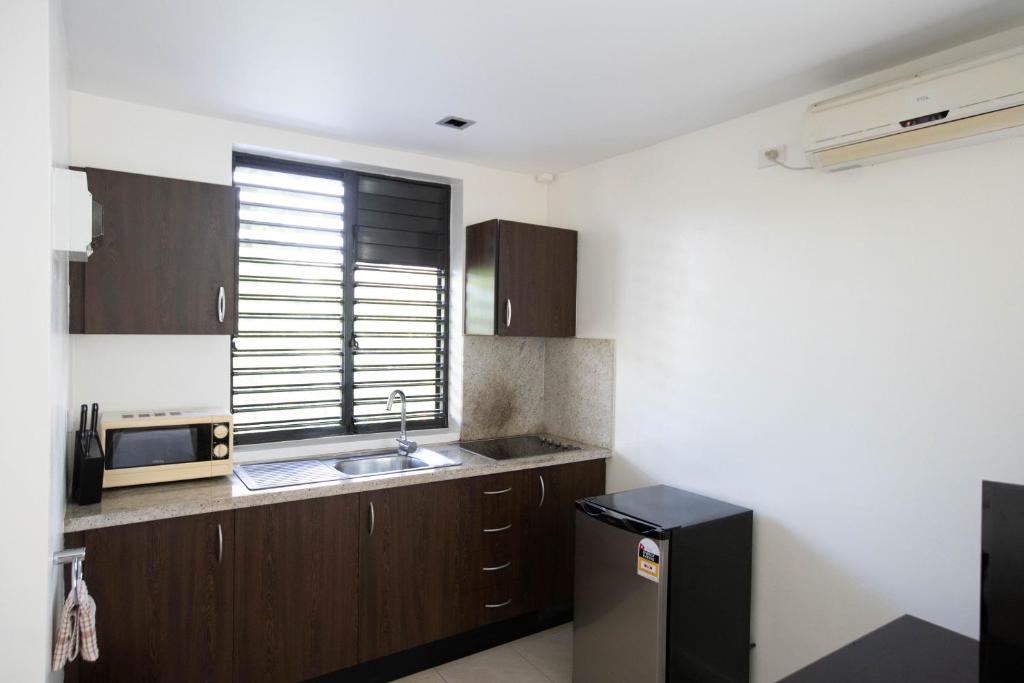 Kuchyň nebo kuchyňský kout v ubytování Dreamview Villas