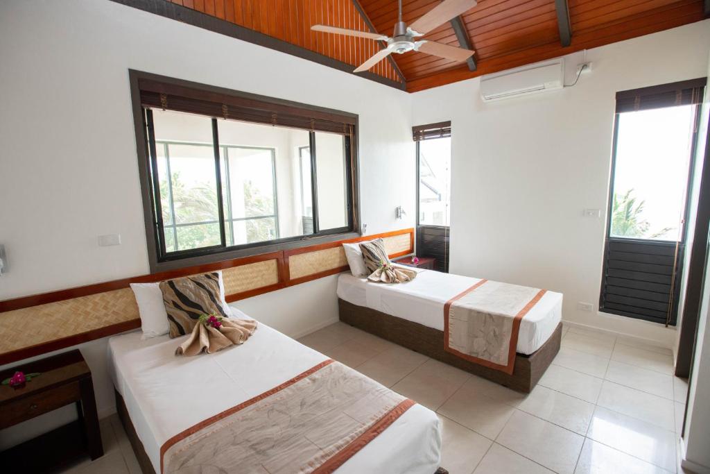 Postel nebo postele na pokoji v ubytování Dreamview Villas