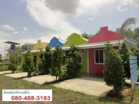 a house with colorful paint on top of it at เซราะกราว บูติก รีสอร์ท Sohground Boutique Resort in Prakhon Chai