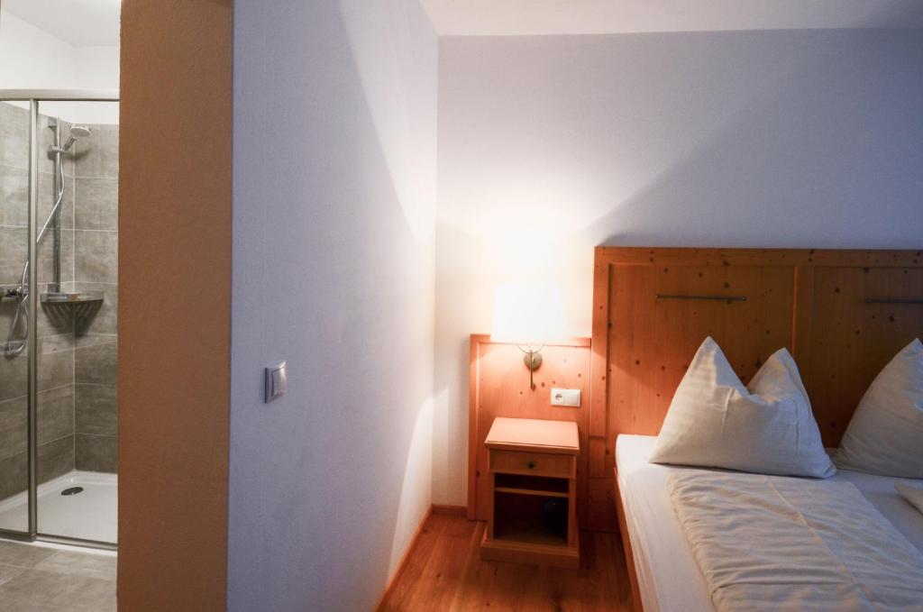 Posteľ alebo postele v izbe v ubytovaní Appartements Hitzenbichler