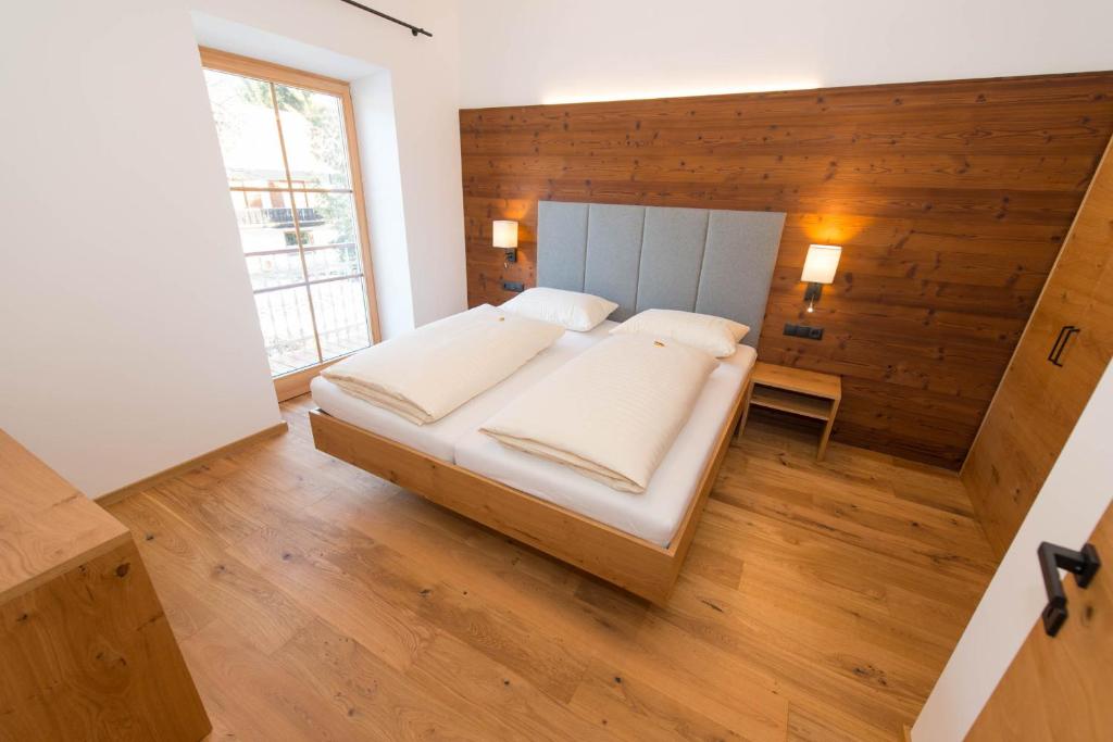 Postel nebo postele na pokoji v ubytování Hotel Brunnwirt