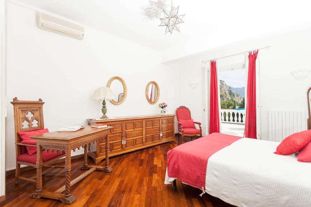 Posteľ alebo postele v izbe v ubytovaní Villa Lamaro