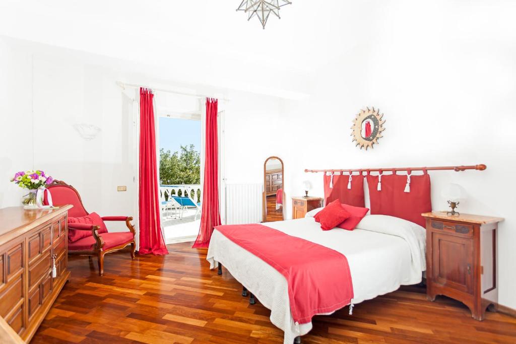 Posteľ alebo postele v izbe v ubytovaní Villa Lamaro