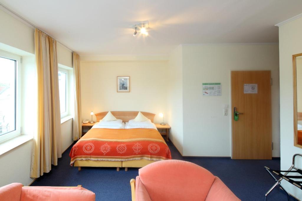 Postel nebo postele na pokoji v ubytování Hotel Am Segelhafen