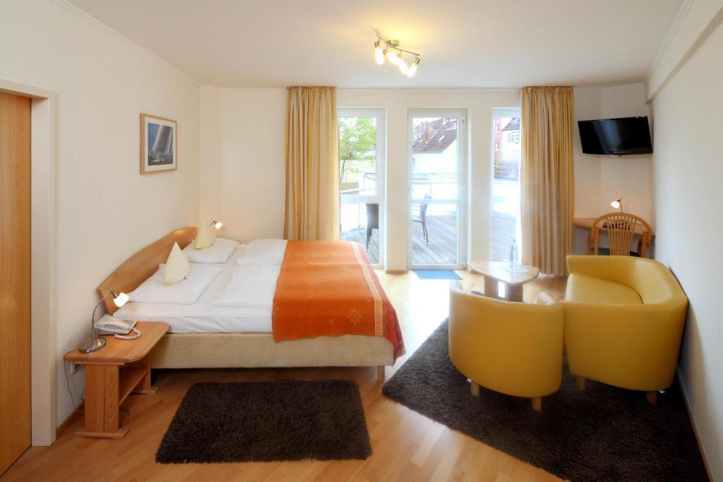 Postel nebo postele na pokoji v ubytování Hotel Am Segelhafen