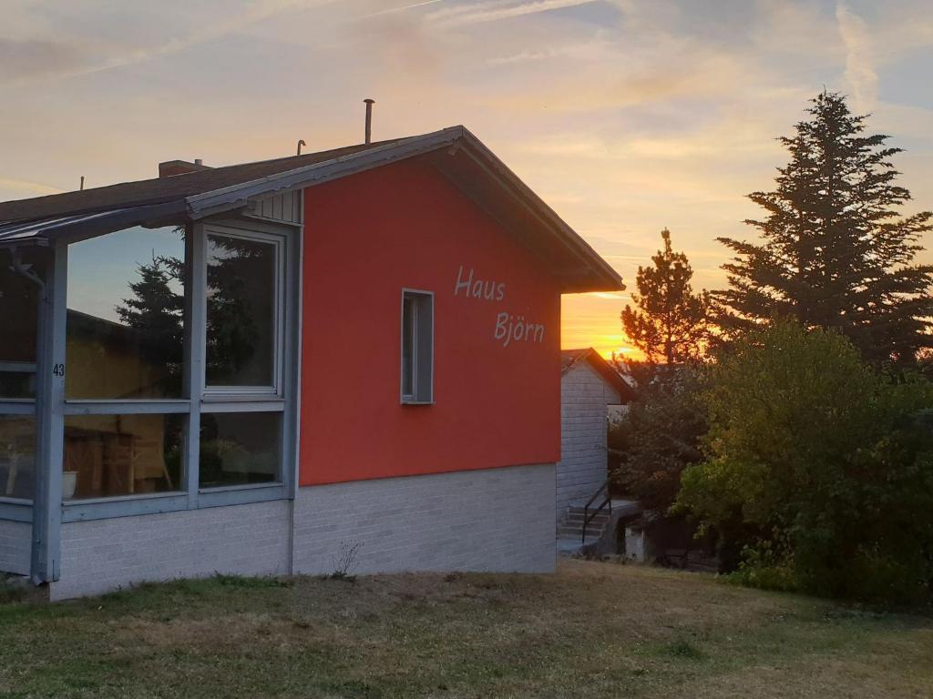 a house with the words hog barn written on it at Beautiful holiday home in the Thuringian Forest with fireplace and whirlpool in Schnett
