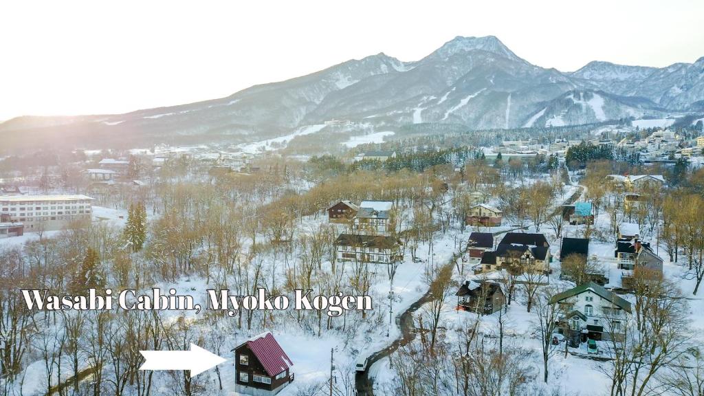 an aerial view of a town in the snow at Lucky Duck Cabin in Akakura