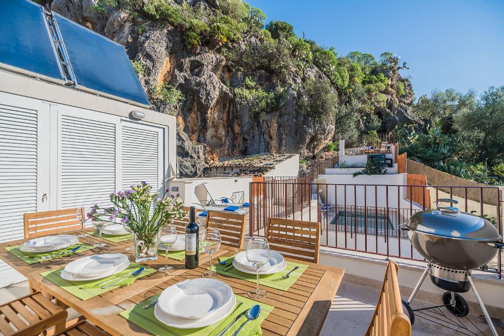 A garden outside Townhouse Can Coa by SunVillas Mallorca