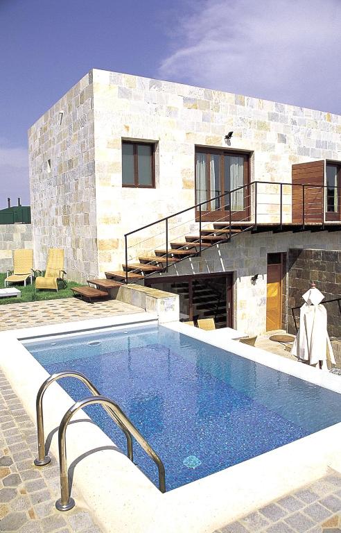 Bazén v ubytování Hotel Boutique Mas Passamaner nebo v jeho okolí