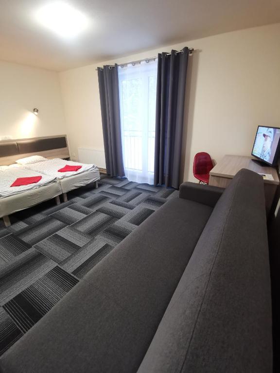 Posteľ alebo postele v izbe v ubytovaní dask resort