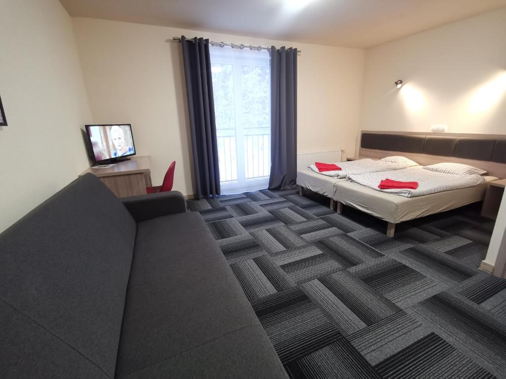 Posteľ alebo postele v izbe v ubytovaní dask resort