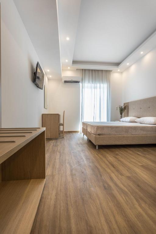 Postel nebo postele na pokoji v ubytování Mare Naxia Hotel