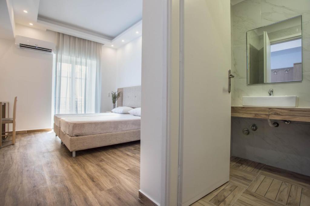Postel nebo postele na pokoji v ubytování Mare Naxia Hotel
