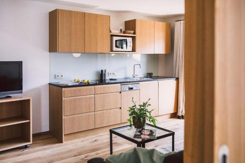 Kuchyň nebo kuchyňský kout v ubytování Hotel Alpenrose