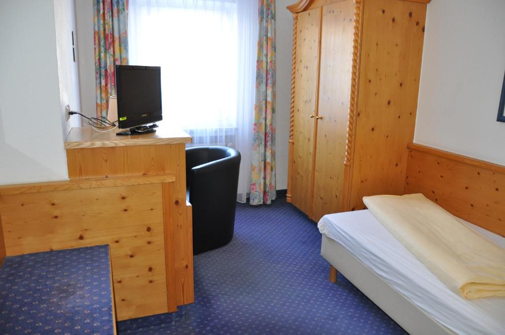 Postel nebo postele na pokoji v ubytování Allgäuer Bergbad