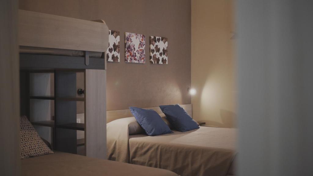 Postel nebo postele na pokoji v ubytování B&B Radici