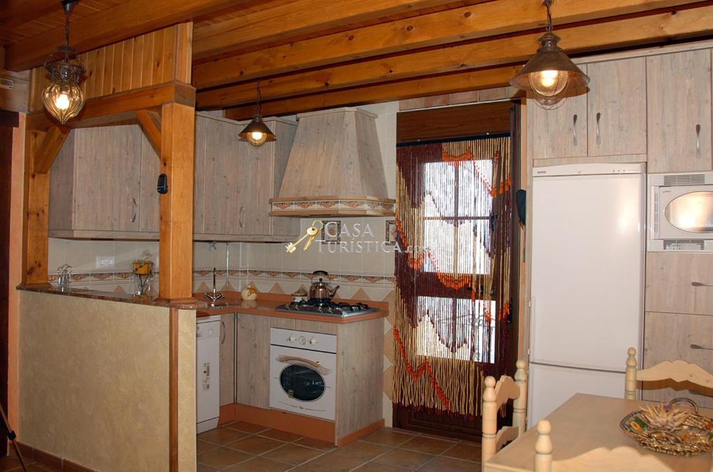Kuchyň nebo kuchyňský kout v ubytování El Algarrobo by CasaTuristica