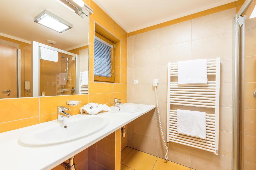 Ein Badezimmer in der Unterkunft Hotel Kaskáda