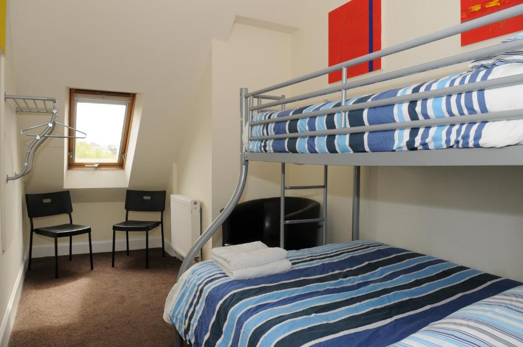Postel nebo postele na pokoji v ubytování The Hostel
