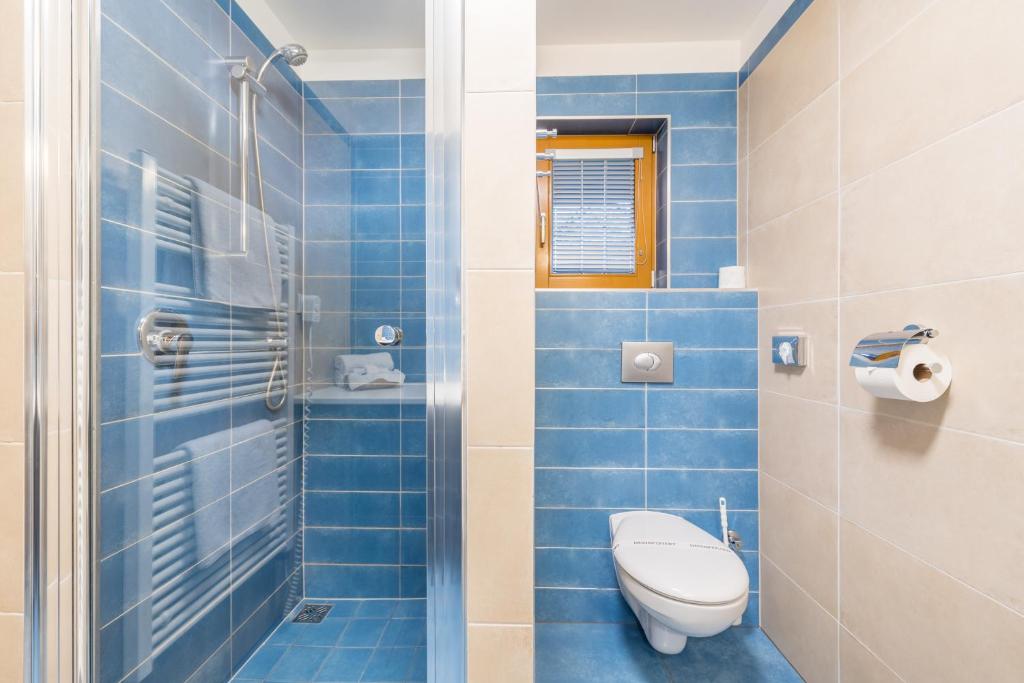 Ein Badezimmer in der Unterkunft Hotel Kaskáda