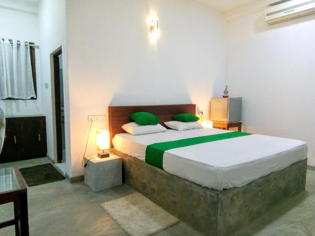 Postel nebo postele na pokoji v ubytování MN House