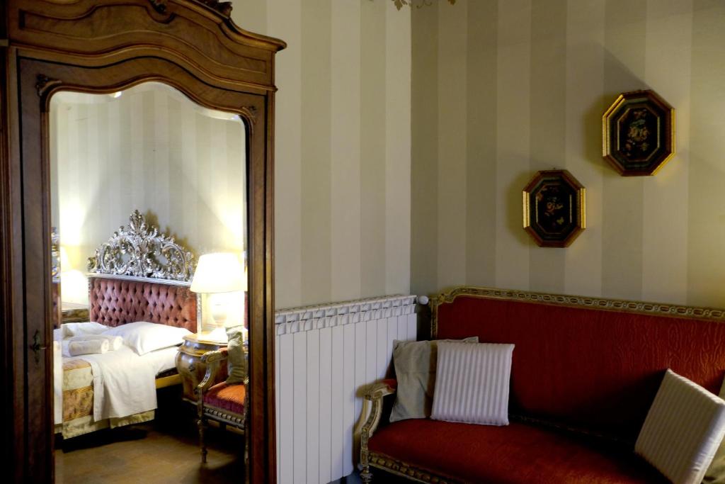 Postel nebo postele na pokoji v ubytování Al Tuscany