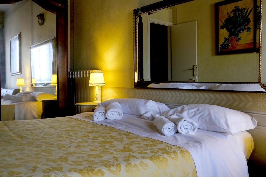 Postel nebo postele na pokoji v ubytování Al Tuscany