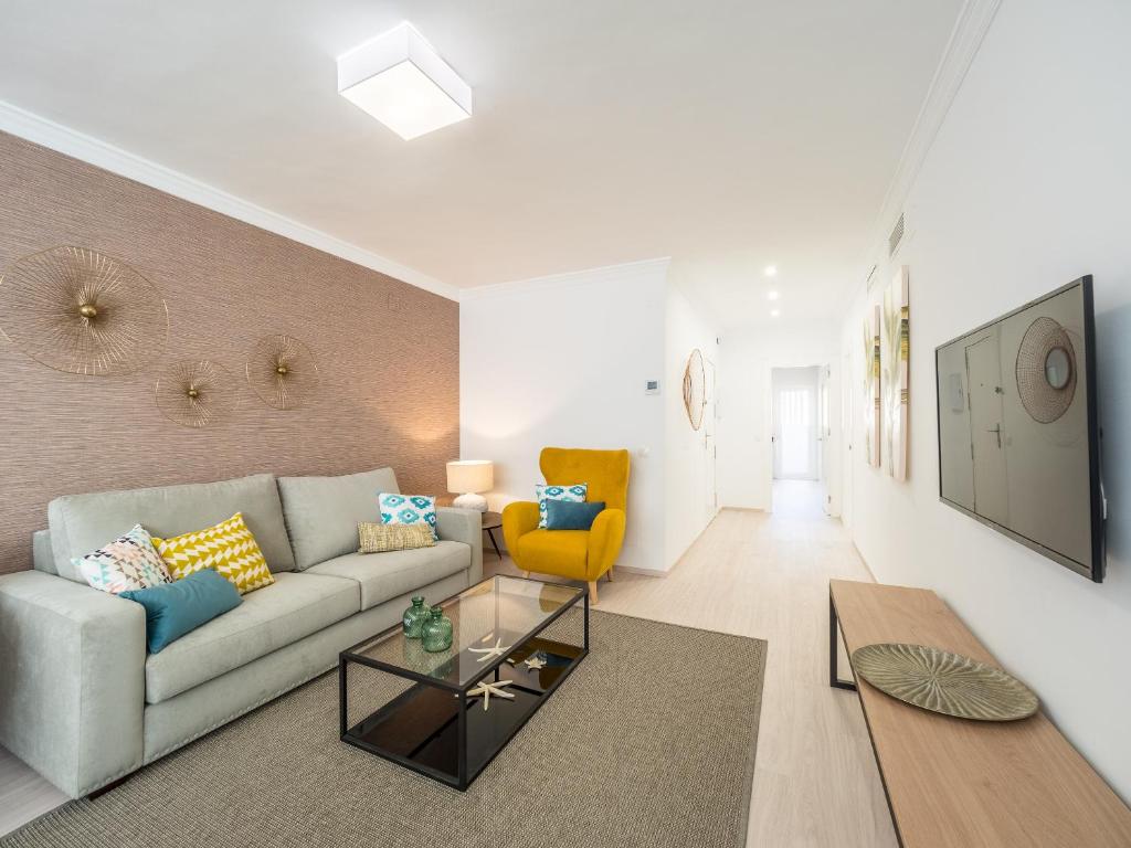 TV a/nebo společenská místnost v ubytování MALAGUETA SEA VIEW - PREMIUM APARTMENT