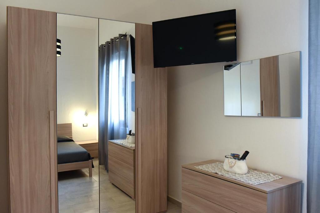 Telewizja i/lub zestaw kina domowego w obiekcie Kero House