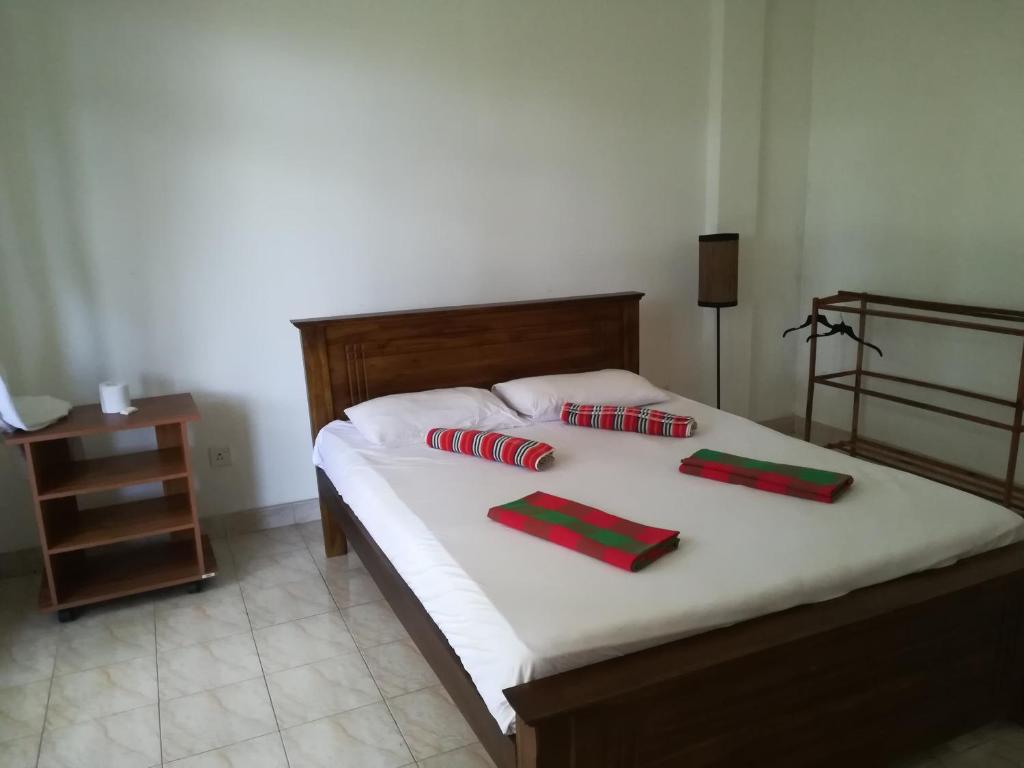 Postel nebo postele na pokoji v ubytování Kandy Hill Escape