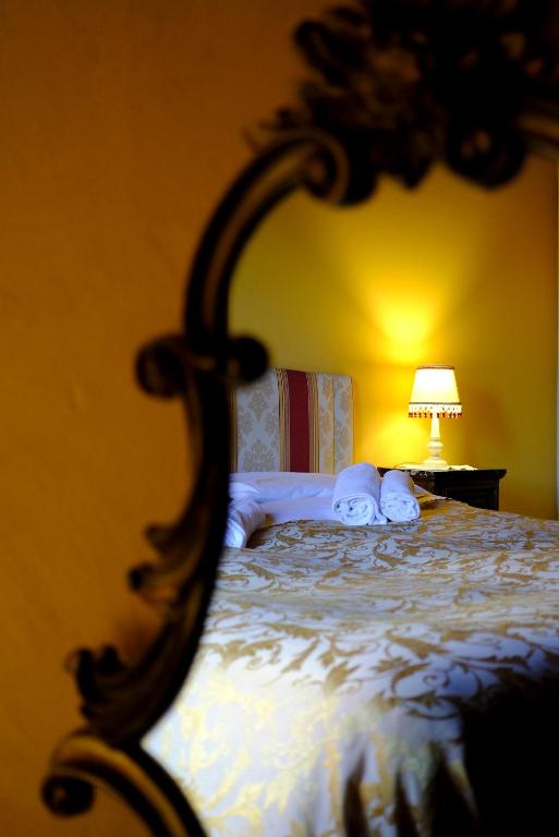 Postel nebo postele na pokoji v ubytování Al Tuscany