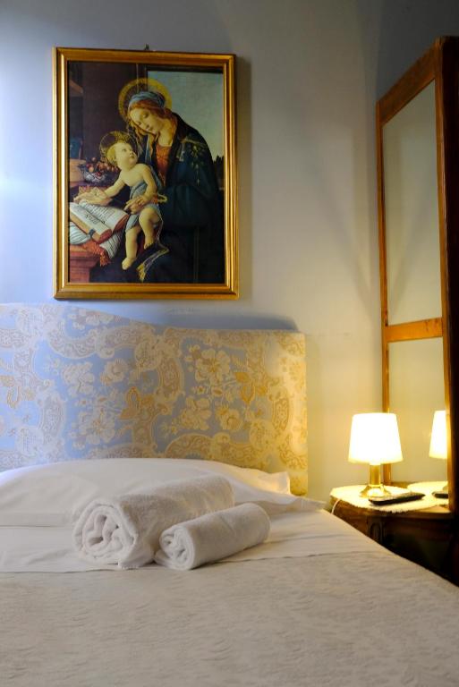 Postel nebo postele na pokoji v ubytování Al Tuscany