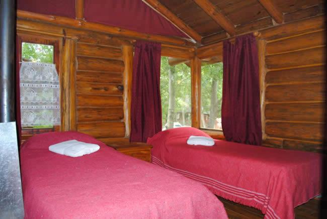 Cama o camas de una habitación en Cabañas Tehuel