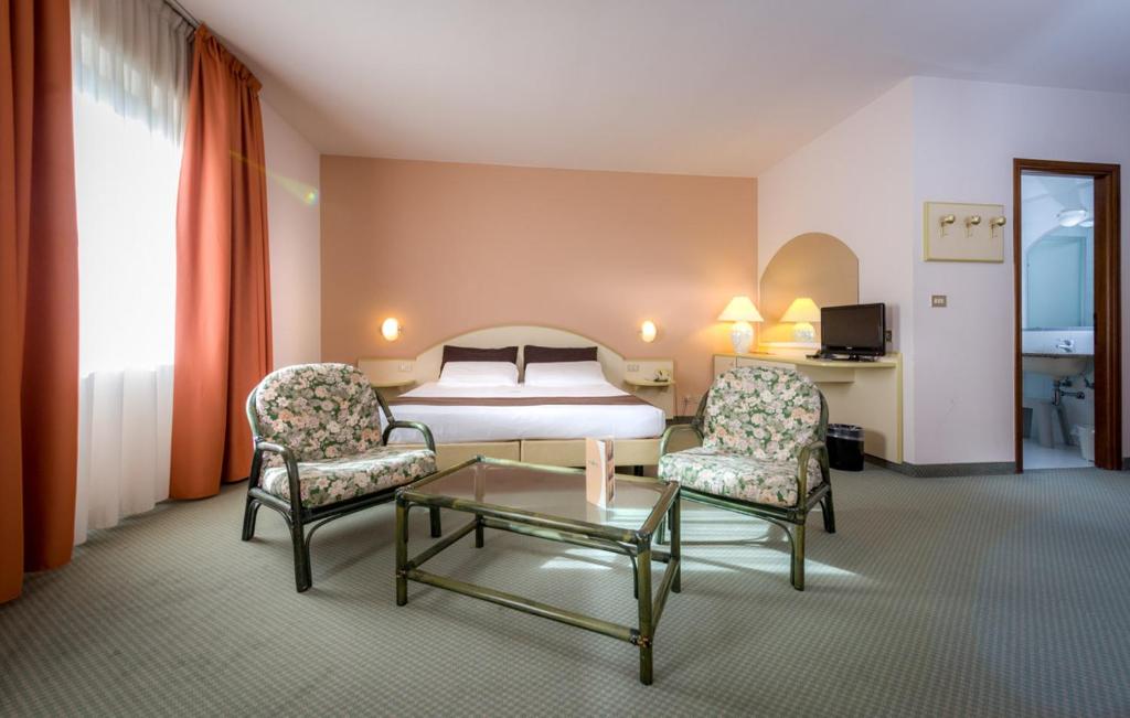 Posezení v ubytování Hotel Des Alpes