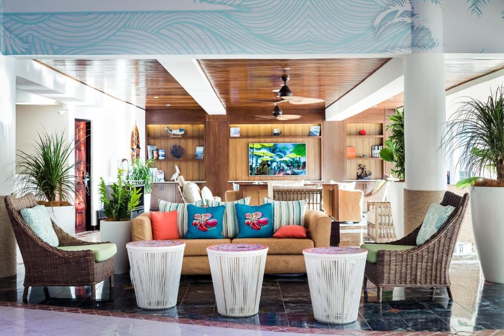 Posezení v ubytování Margaritaville Beach Resort Playa Flamingo
