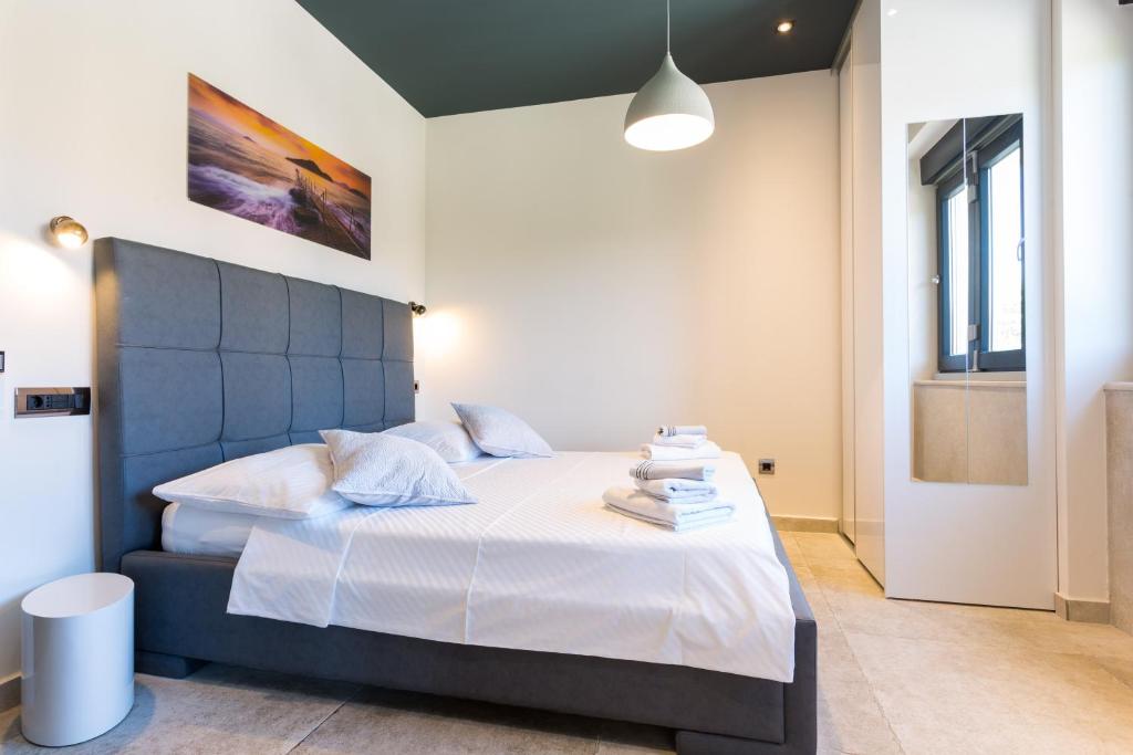 Posteľ alebo postele v izbe v ubytovaní New Apartment ParkView/CityView