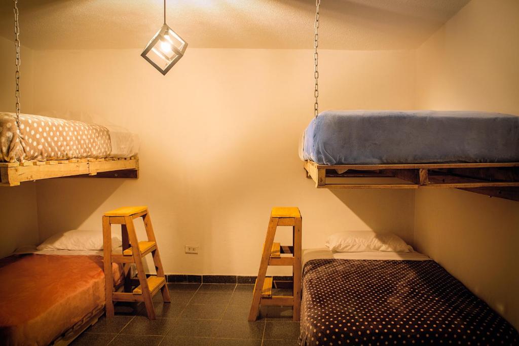 Postel nebo postele na pokoji v ubytování Bababuy Hostel