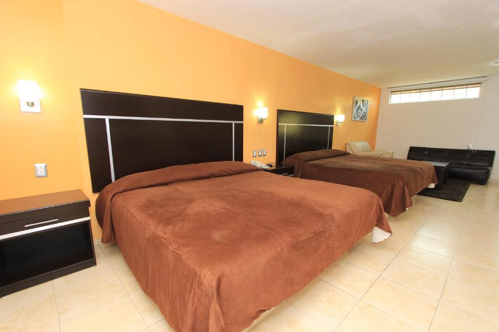 Postel nebo postele na pokoji v ubytování Hotel 5 inn