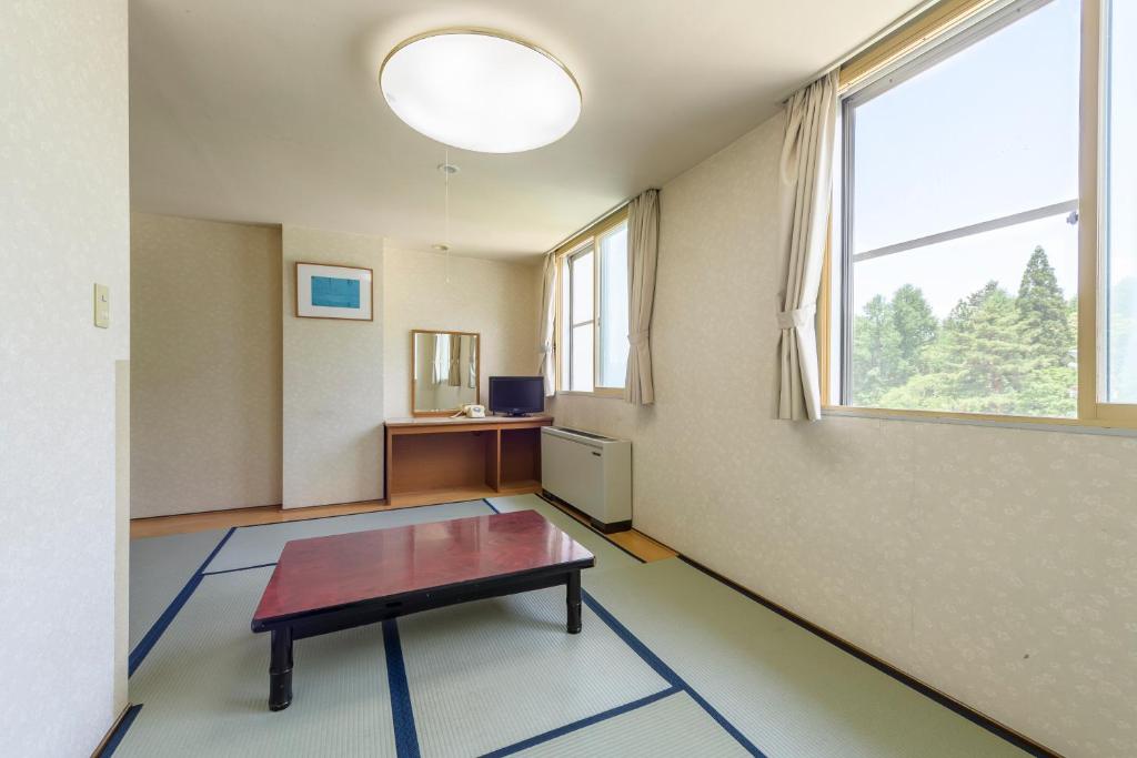 TV a/nebo společenská místnost v ubytování Hotel Tagawa