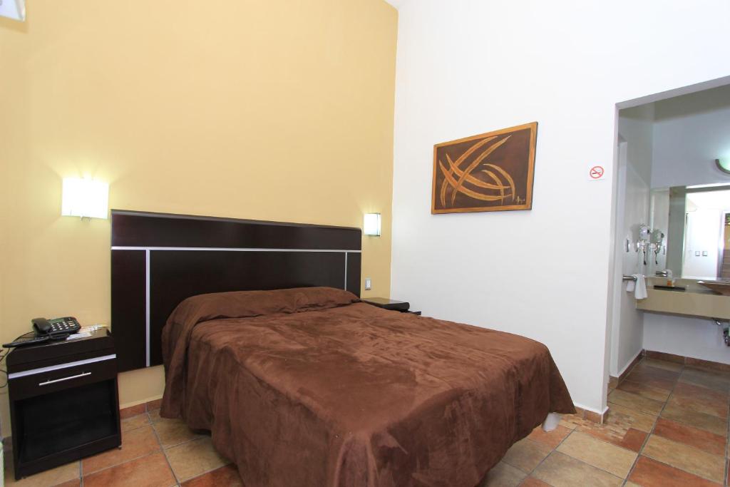 Postel nebo postele na pokoji v ubytování Hotel 5 inn