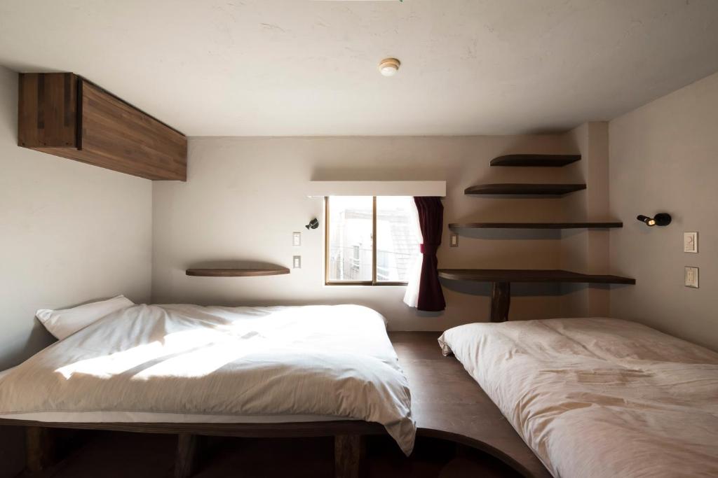 Postel nebo postele na pokoji v ubytování Hotel Haus St Anton