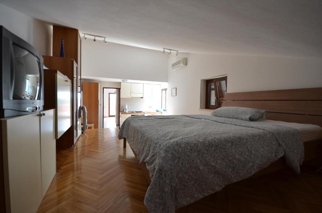 Cama o camas de una habitación en Apartments Villa Bartol