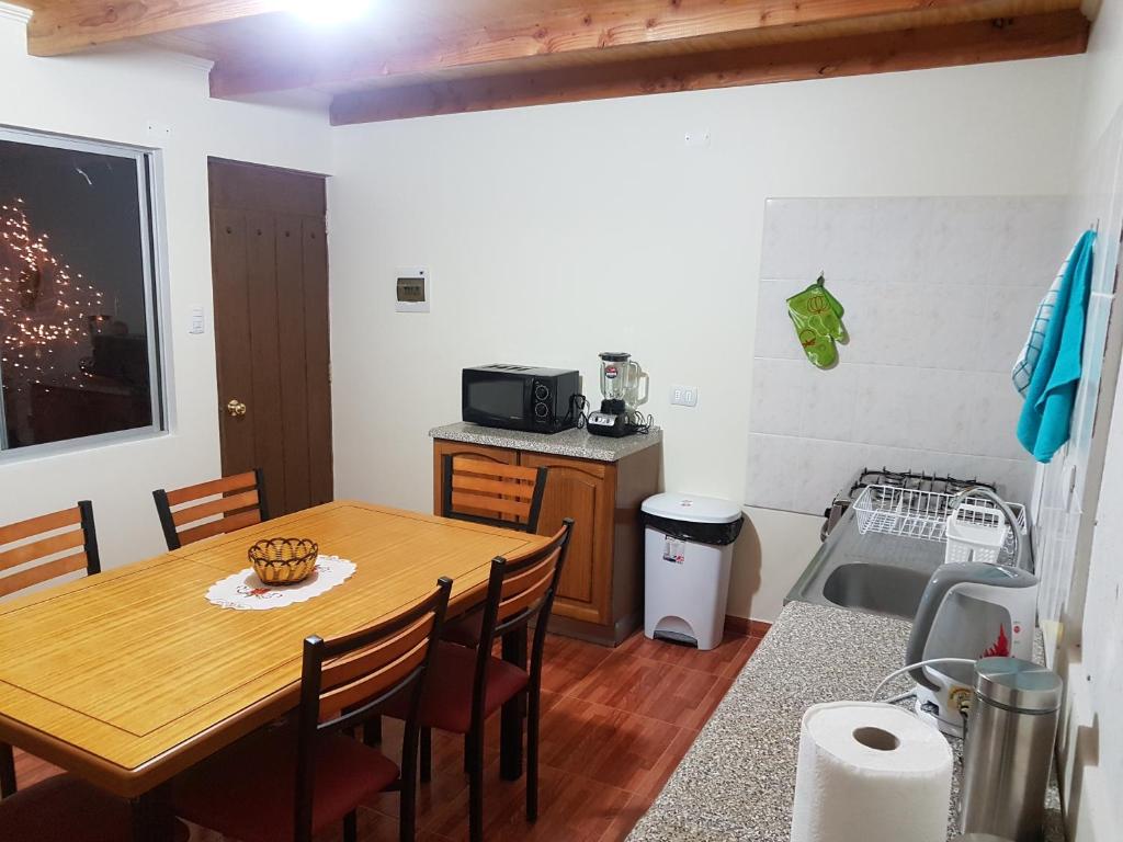 Kuchyň nebo kuchyňský kout v ubytování Hostal Ckamai