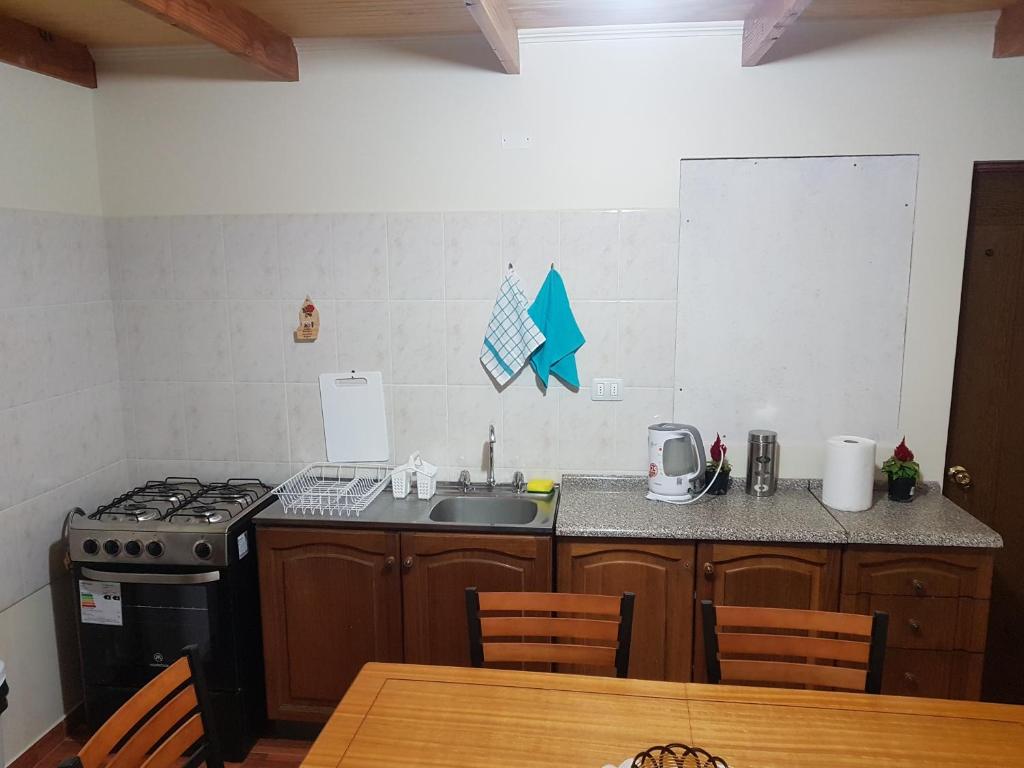 Kuchyň nebo kuchyňský kout v ubytování Hostal Ckamai