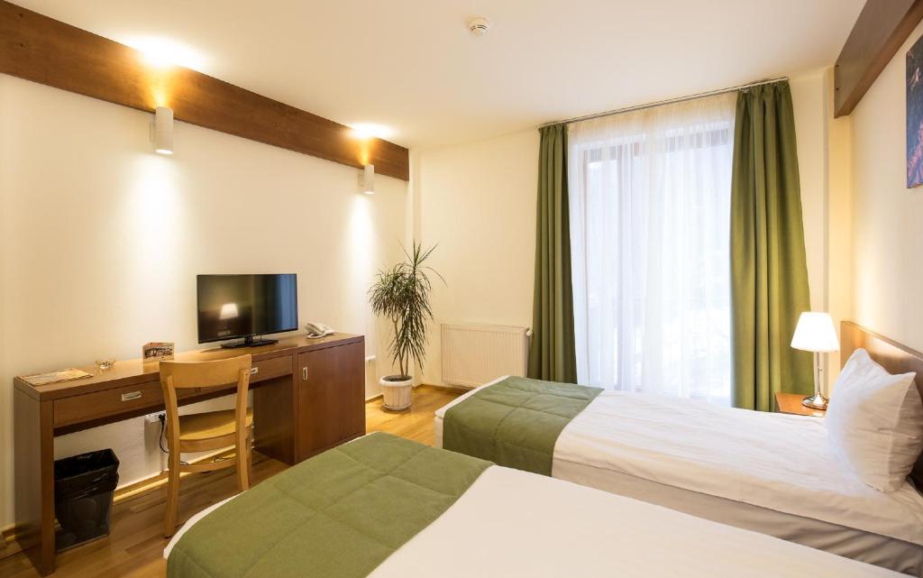 Postel nebo postele na pokoji v ubytování Hotel Kolping