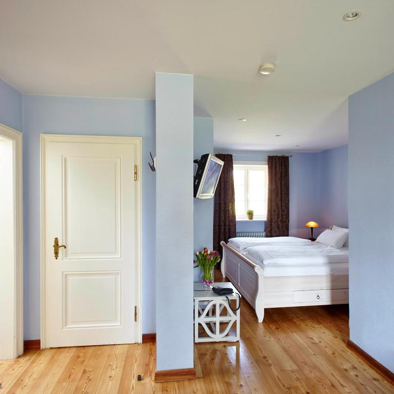 Postel nebo postele na pokoji v ubytování Hotel Hof Tütsberg
