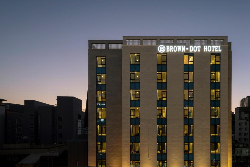 a building with the show dog hotel on top of it at Browndot Business Seomyeon in Busan