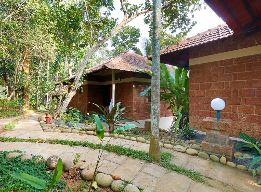 Zahrada ubytování Raindrops Resorts Wayanad