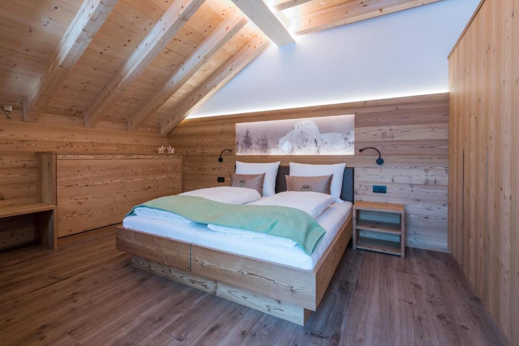 A bed or beds in a room at Les Pizades
